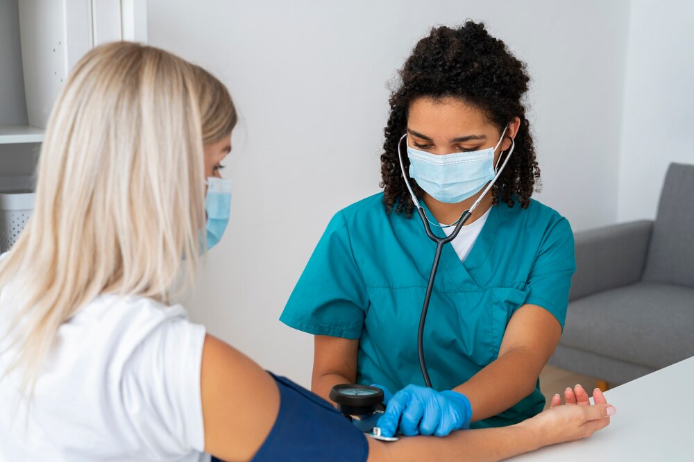 Female nurse at the clinic practicing medicine